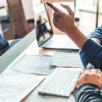 Developing programmer Team Development Website design and coding technologies working in software company office