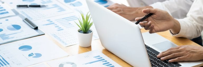 Two business teamwork calculating a valuation in workplace.